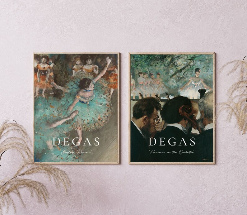 May include: Two framed prints of paintings by Edgar Degas. The first print shows a ballerina in a green and white tutu, dancing on stage. The second print shows musicians in an orchestra, with a focus on the conductor. Both prints have the artist's name and the title of the painting.