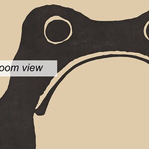 May include: Black and white illustration of a frog with a simple, minimalist design. The frog is facing forward with its mouth closed and its eyes are large and round. The frog is outlined in black and filled in with white. The background is a light beige color.