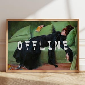May include: A framed painting of a woman lying on a green sofa. The woman is wearing a black dress and has her hair pulled back. The word "OFFLINE" is written in white across the image.