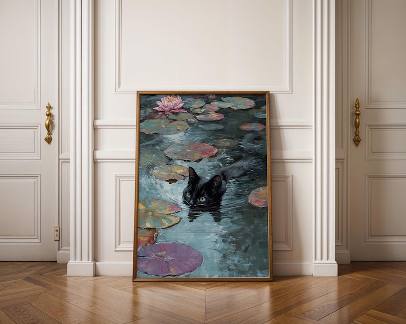 May include: A framed painting depicts a black cat swimming in a pond with lily pads and a pink water lily. The artwork has a vintage aesthetic, with a wooden frame and a focus on the cat's eyes.