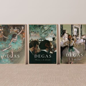 May include: Three framed art prints of ballet dancers by Edgar Degas. The prints are in a muted color palette of green, brown, and white. The first print shows a dancer in a green tutu, the second print shows dancers in a green and brown setting, and the third print shows dancers in a white and green setting.