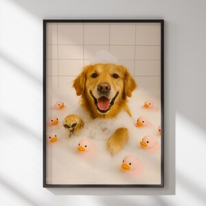 May include: Framed print of a Golden Retriever dog in a bubble bath, surrounded by pink rubber duckies. The dog is smiling with its tongue out, and the bubbles cover its head and body.