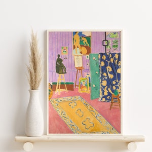 May include: A painting of a room with a purple wall, a blue curtain, and a yellow rug. There are several paintings on the wall, including a nude figure and a landscape. The room is filled with light and color.