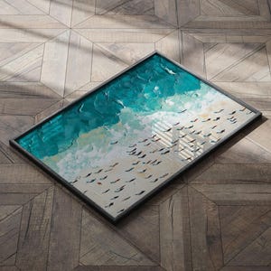May include: A framed painting depicting a turquoise ocean with white waves and a flock of birds flying overhead.