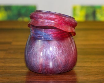 Tarro con tapa de rosca brillante de color rosa y morado