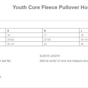 May include: Size chart for a youth core fleece pullover hooded sweatshirt. The chart shows measurements in inches for chest width, sleeve length, and body length at back for sizes XS, S, M, L, and XL.