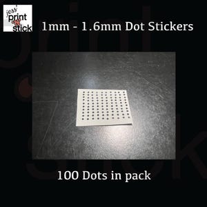 May include: A sheet of white dot stickers with 100 dots in a pack. The black dots measure 1mm to 1.6mm in diameter. The stickers are on a dark surface. Text reads "1mm - 1.6mm Dot Stickers" and "100 Dots in pack".