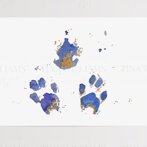 May include: Three blue paw prints with gold accents on a white background. The paw prints are watercolour painted and have a soft, abstract look.