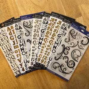 Assorted Stickers, Letters and Swirls