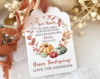 May include: A white card with a watercolor illustration of fall leaves and pumpkins. The card says "Give thanks to the Lord, for he is good; his love endures forever. Psalm 107:1" and "Happy Thanksgiving! Love, The Johnsons".