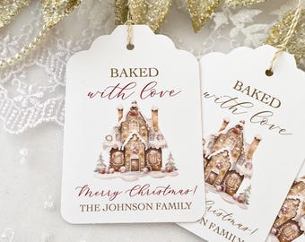 May include: Two white rectangular gift tags with scalloped tops and gold string. Each tag features a watercolor gingerbread house illustration, the text BAKED with love, Merry Christmas!, and the personalized text THE JOHNSON FAMILY.