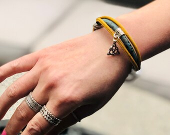 Natural Cork Bracelet with Celtic Trinity Knot Charm and Silver Beads. send to friend!