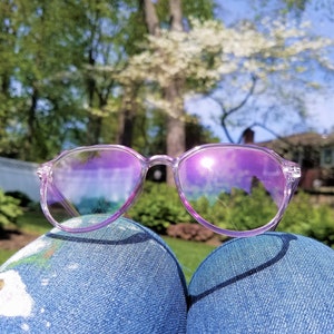 Blue light glasses shaped OVER SIZED YK2 style with light purple color. Special plastic material makes its lightweight and adjustable. They feel comfortable on your ears and nose.