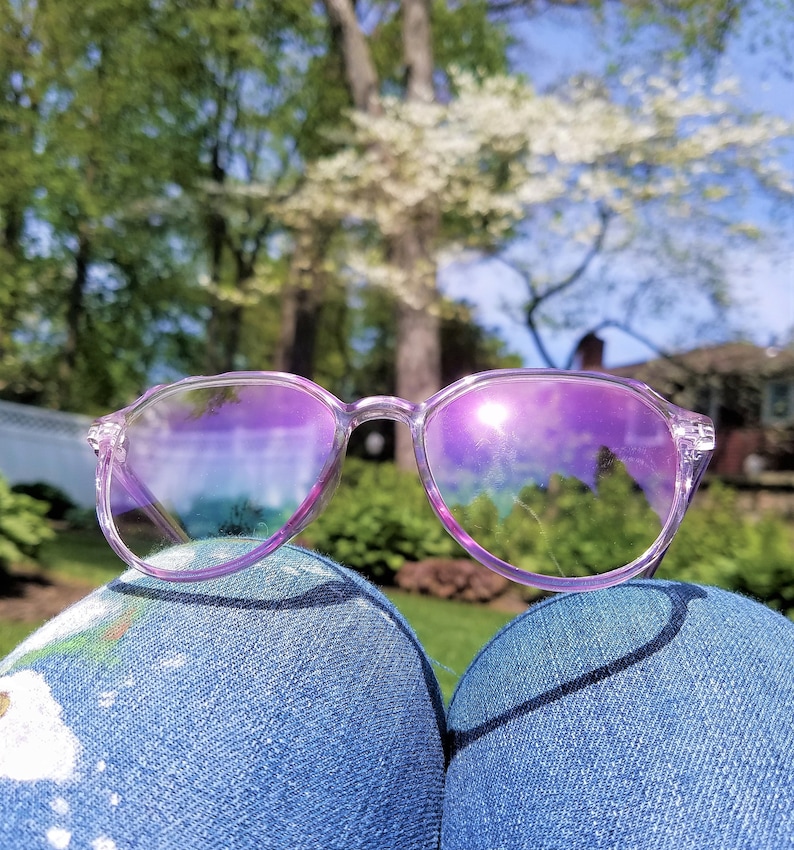 Blue light glasses shaped OVER SIZED YK2 style with light purple color. Special plastic material makes its lightweight and adjustable. They feel comfortable on your ears and nose.