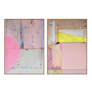 May include: Two framed abstract paintings. The left painting features a large pink semi-circle and rectangular shapes in pink, blue, and grey. The right painting has yellow and pink rectangular shapes. Both paintings have gold frames.