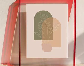 May include: A red acrylic frame with a white mount and a minimalist line drawing of a plant with leaves in shades of green and brown. The drawing is set against a light beige background.