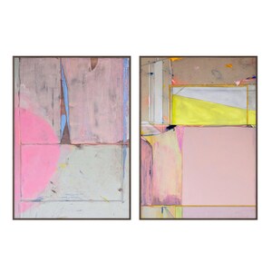 May include: Two framed abstract paintings. The left painting features a pink semi-circle and rectangular shapes in pink, grey, and blue. The right painting has a yellow triangle and pink rectangular shapes. Both paintings have brown frames.