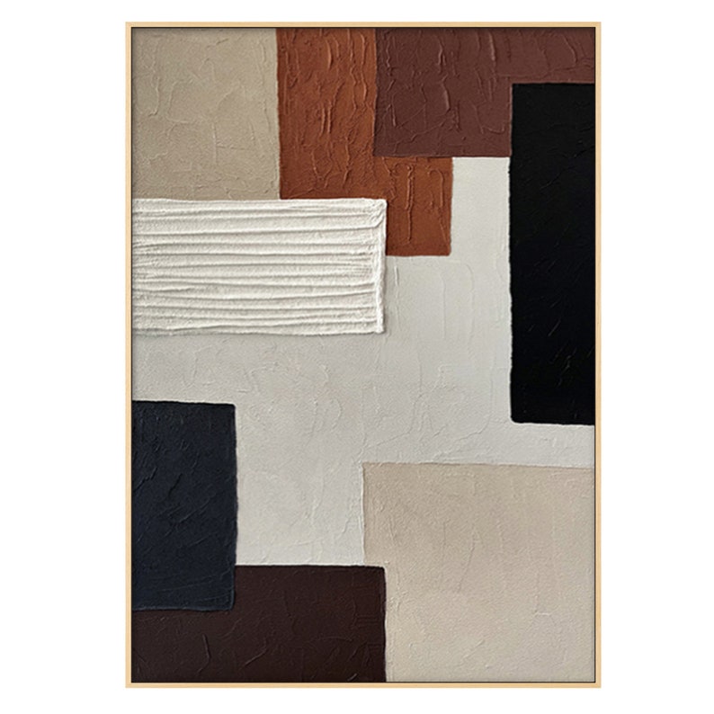 May include: Abstract art painting with geometric shapes in shades of brown, beige, and black. The painting has a textured surface and is framed in a gold frame.