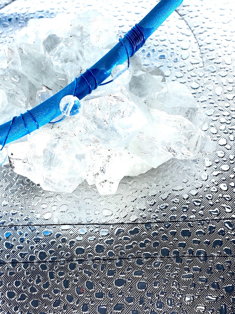 Quartz Crystal Beads Wrapped with Teal Wire on a Blue Satin Headband