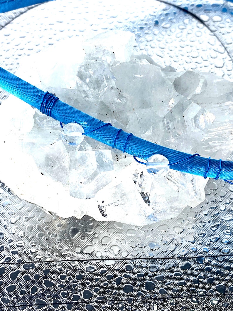 Quartz Crystal Beads Wrapped with Teal Wire on a Blue Satin Headband