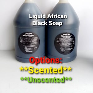 May include: Two large bottles of liquid African black soap. The bottles are dark gray with white caps and black labels. The text on the bottles reads "Liquid African Black Soap" and "Afro Cosmetics". Options: Scented, Unscented.