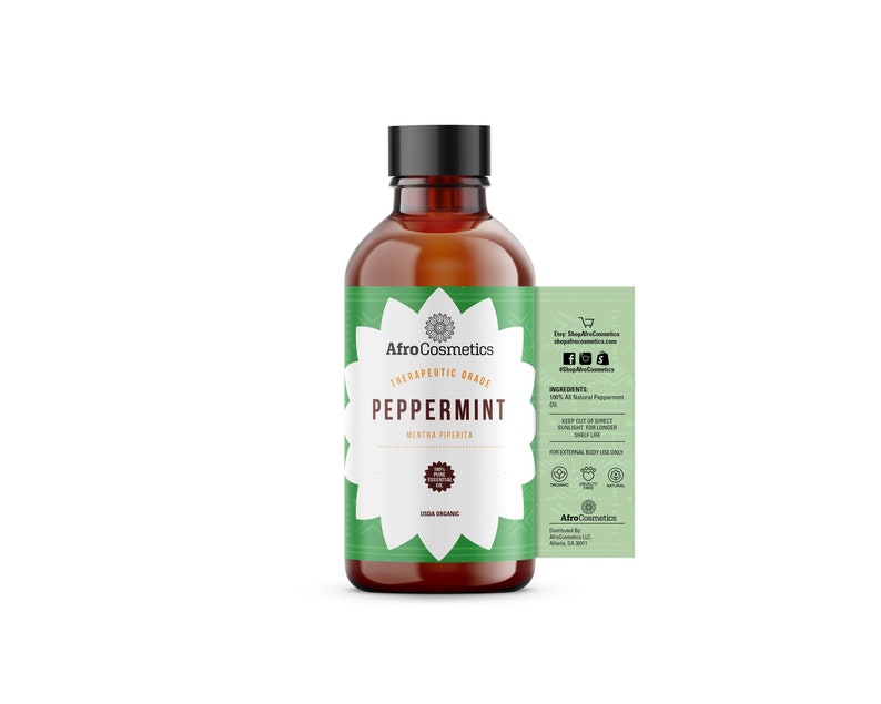 May include: A brown glass bottle with a black cap, labeled "AfroCosmetics Therapeutic Grade Peppermint Mentha Piperita USDA Organic". The bottle is on a white background with a label on the right side listing ingredients, usage instructions, and contact information.