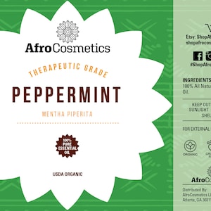 May include: A white label with a green background and a brown flower design. The label reads "Afro Cosmetics" in a brown font. The label also reads "Therapeutic Grade Peppermint Mentha Piperita" in a brown font. The label also reads "100% Pure Essential Oil" in a brown font. The label also reads "USDA Organic" in a brown font. The label also reads "Ingredients: 100% All Natural Peppermint Oil." The label also reads "Keep Out of Direct Sunlight for Longer Shelf Life." The label also reads "For External Body Use Only." The label also reads "Organic, Cruelty Free, Natural." The label also reads "Distributed By: AfroCosmetics LLC, Atlanta, GA 30311." The label also reads "Etsy: ShopAfroCosmetics shopafrocosmetics.com #ShopAfroCosmetics" in a brown font.