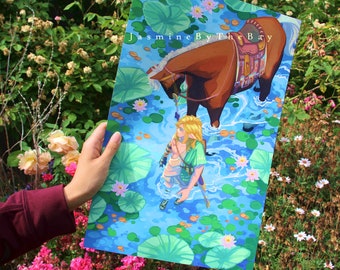 May include: A digital illustration of a person with long blonde hair and a green tunic riding a brown horse through a blue pond with lily pads. The text "Jasmine By The Bay" is in the top right corner of the image.