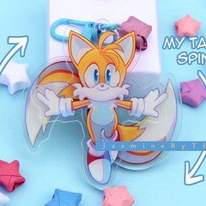 Spinning Tails Charm