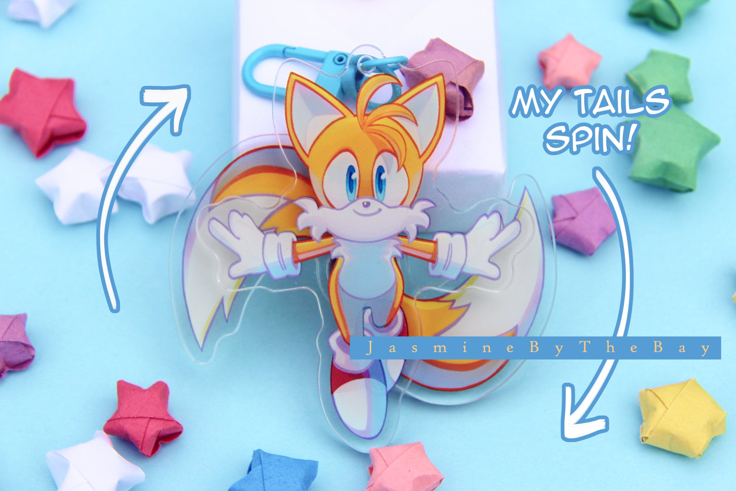 Spinning Tails Charm