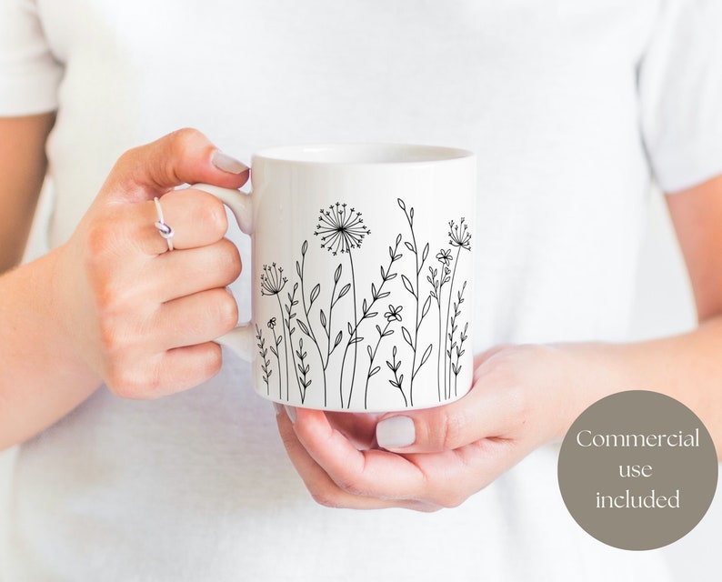 White coffee mug with minimalist field plant image