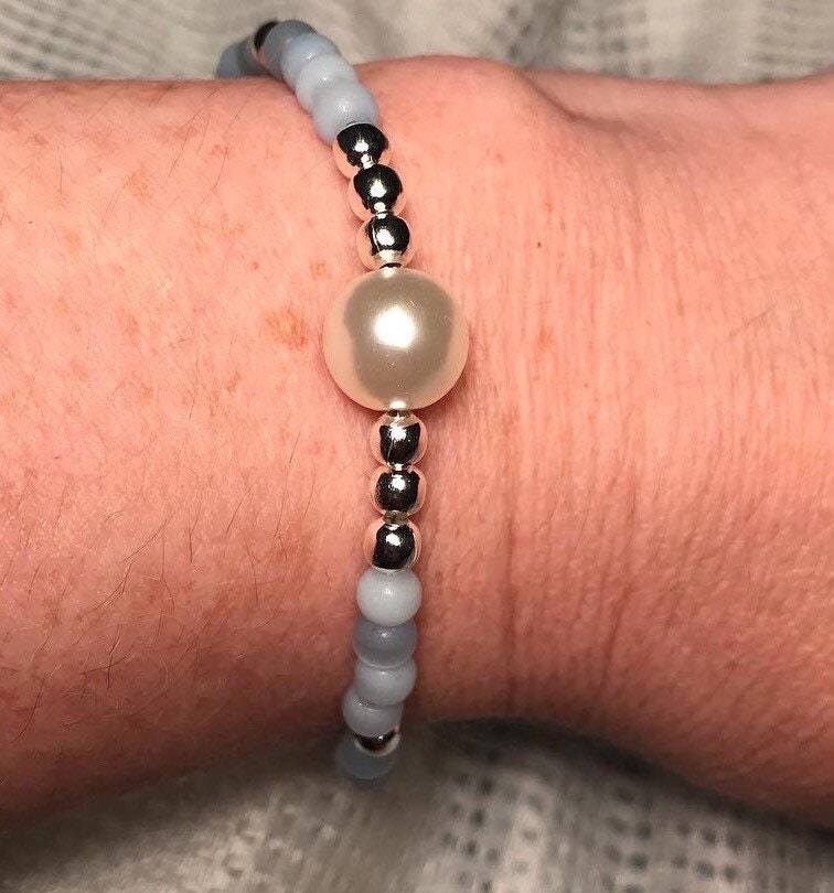Handmade light blue cats eye bracelet with pearl focal bead Etsy
