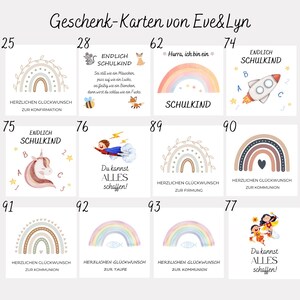 May include: A collection of greeting cards with various designs and text. The cards feature rainbows, a rocket, a unicorn, and other illustrations. Text includes "Herzlichen Gl&uuml;ckwunsch" and "Du kannst ALLES schaffen!"
