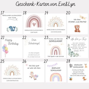 May include: A collection of gift cards with various designs and text. The cards feature illustrations of rainbows, a whale, a teddy bear, balloons, and a unicorn. Text includes phrases like "Happy Birthday," "Endlich Schulkind," and "Herzlichen Gl&uuml;ckwunsch."