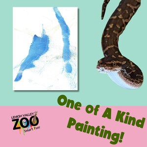 May include: A painting with blue brushstrokes on a white canvas, next to a brown and black snake. The text reads "One of A Kind Painting!" and the Lehigh Valley Zoo logo is visible.