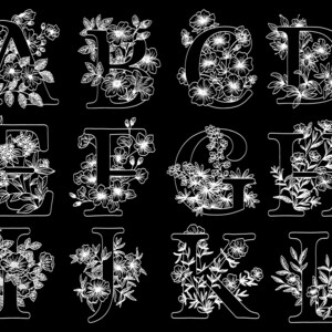 May include: A set of 10 white floral alphabet letters, A through L, with a black background. Each letter is outlined in white and decorated with a floral design.
