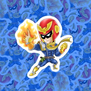 Könnte beinhalten: Ein Aufkleber mit einer Cartoonfigur in einem blau-gelben Anzug mit rotem Helm und goldenem Adleremblem. Die Figur ist von einem blauen Hintergrund mit sich wiederholenden Bildern derselben Figur umgeben. Die Figur hält einen Feuerball.
