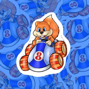 May include: A sticker featuring a cartoon squirrel driving a blue and white race car with orange wheels. The car has a large number 8 on the side. The squirrel is orange and brown with blue eyes and is smiling.