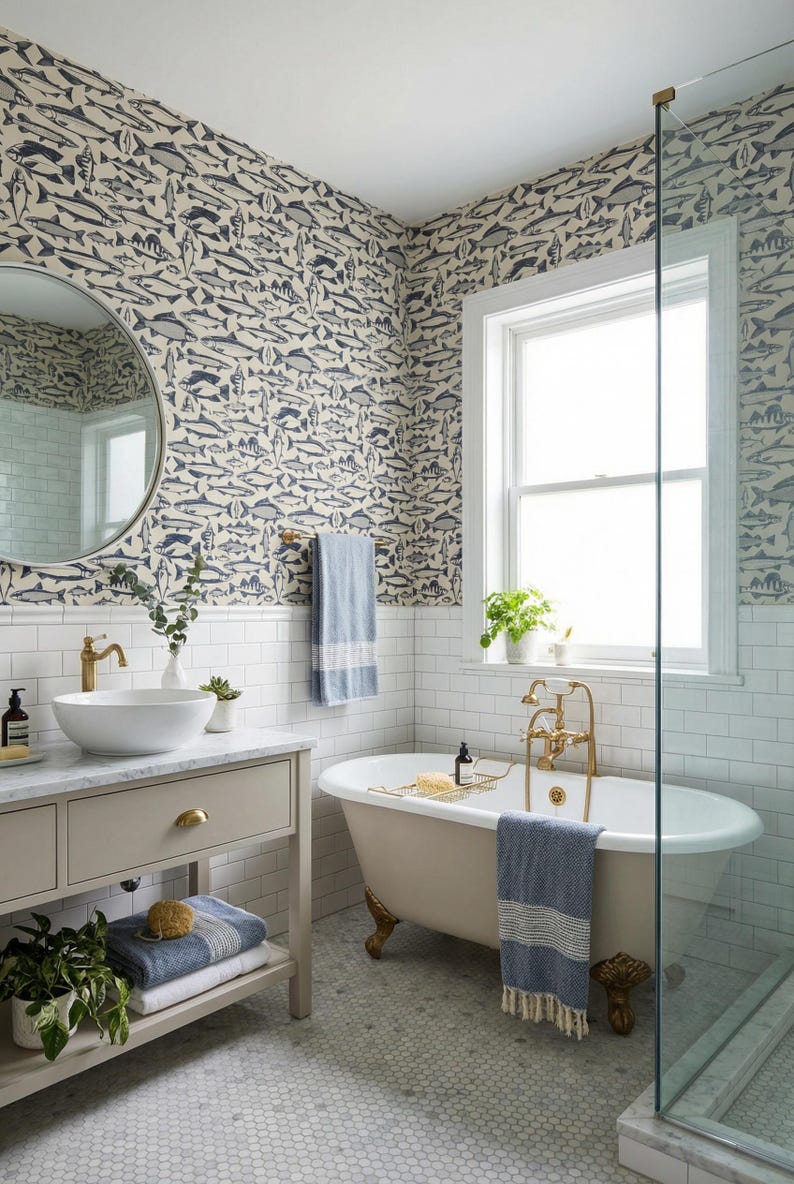 May include: A bathroom with a vintage clawfoot tub, a vanity with a round sink, and a shower. The walls are decorated with a fish pattern wallpaper. The room has a window and a round mirror.
