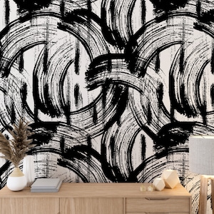 Puede incluir: Papel tapiz abstracto en blanco y negro con un patrón de pinceladas. El papel tapiz presenta un patrón repetitivo de círculos y líneas superpuestos.