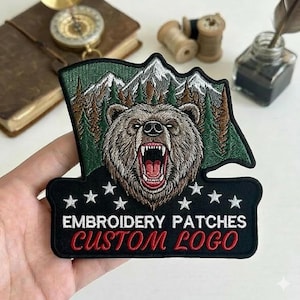 Patch com logotipo personalizado - Feito sob encomenda - Patch bordado personalizado, com base para costura e termocolante.