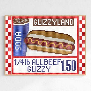 May include: Cross-stitch artwork featuring a hot dog and soda, with the text "GLIZZYLAND." The design includes a hot dog with mustard and relish, a blue soda cup, and the text "1/4lb ALL BEEF GLIZZY."