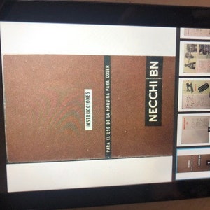 May include: A close-up of a brown instruction manual for a Necchi sewing machine. The cover has the title "Instrucciones" and "Para el uso de la maquina para coser" in Spanish. The brand name "NECCHI BN" is printed in white on a black background.