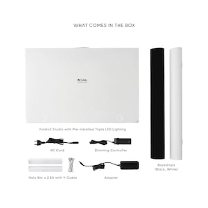 May include: A white Foldio3 Studio with pre-installed triple LED lighting, two backdrops (black and white), an AC cord, a dimming controller, and an adapter. The studio is a portable photography lightbox.