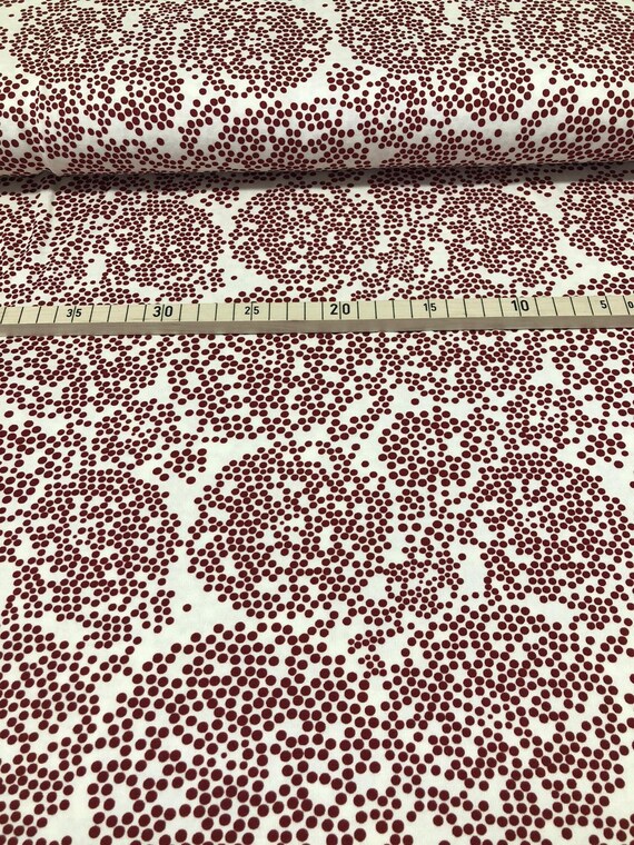 Viskose Jersey Creme mit roten Punkten