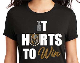 It Hurts To Win Knights flat white and glitter accent decal on black shirt