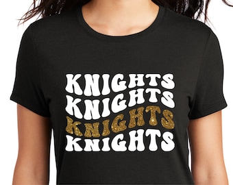 Wavy Knights in white screen with gold glitter accent decal on black shirt
