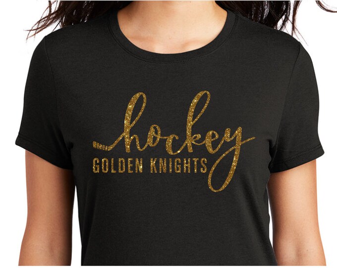 Hockey stick Golden Knights gold glitter decal on black shirt