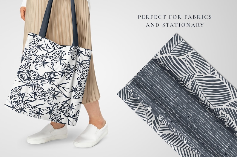 May include: A white tote bag with a black floral pattern. The bag has two black handles. The text "PERFECT FOR FABRICS AND STATIONARY" is visible in the background.