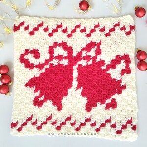 May include: A white crochet square with a red crocheted design of two bells with bows. The square has a white border with a red zig-zag pattern.